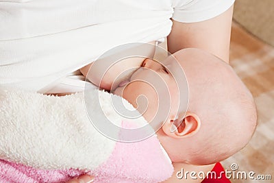 Baby breast feeding Stock Photo