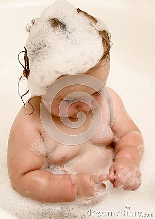 Baby With Bubbles Stock Photo