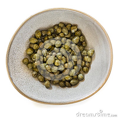 Baby Capers in Stoneware Bowl Top View Isolated on White Stock Photo