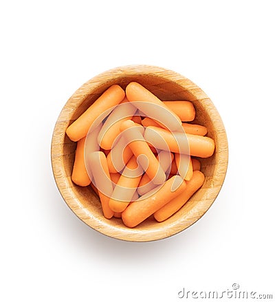 Baby carrot vegetable in bowl. Mini orange carrots isolated on white background Stock Photo