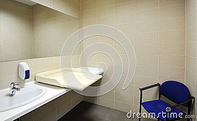 Baby changing diaper room Stock Photo