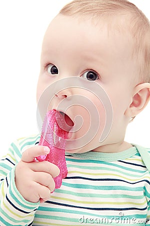 Baby with chew toy Stock Photo