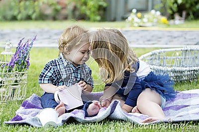 Baby child enjoy the summer on the nature in the park outdoor. Children on pirnic. Stock Photo