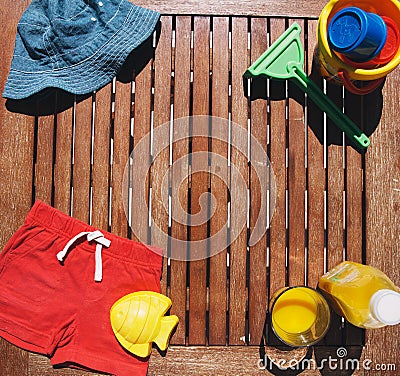 Baby Child summer stuff on a wooden background Stock Photo