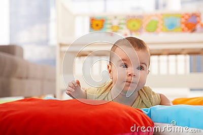 Baby concentrating on crawling Stock Photo