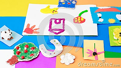 Baby crafts from play dough and colourful paper Stock Photo