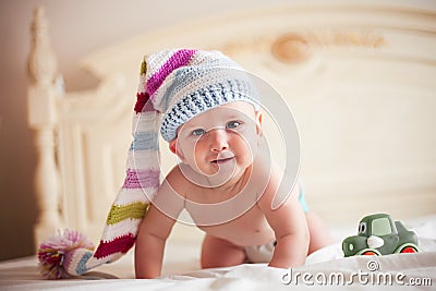 Baby in crochet hat Stock Photo