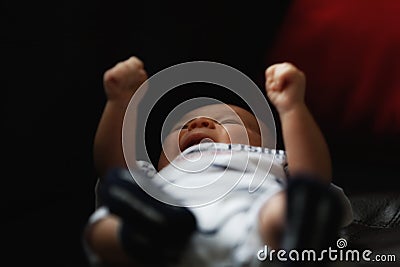 Baby crying demanding attention Stock Photo