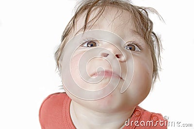 Baby with determined expression Stock Photo