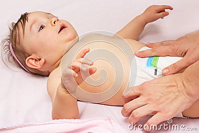 Baby diaper change Stock Photo