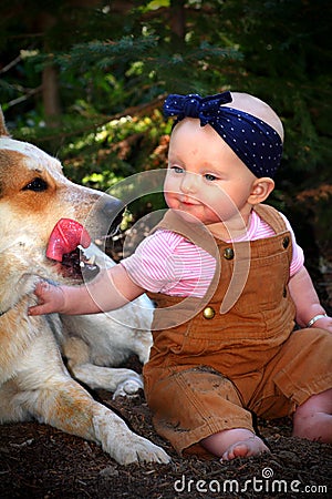 Baby in Dirt with Dog Stock Photo