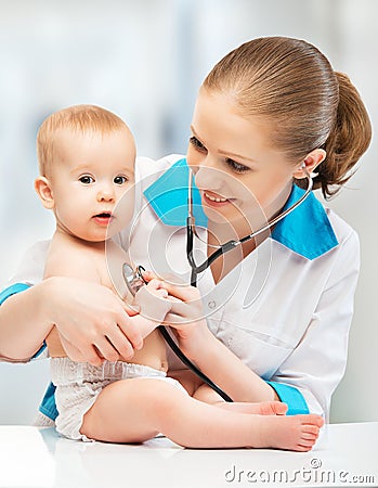 Baby and doctor pediatrician. doctor listens to the heart with s Stock Photo