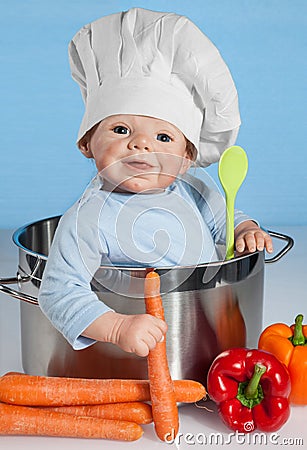 Baby Doll with chef's hat Stock Photo