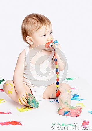 Baby with dummy Stock Photo