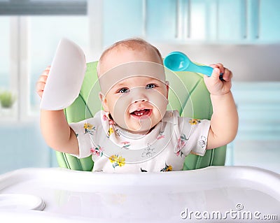 Baby eating,child`s nutrition. Stock Photo