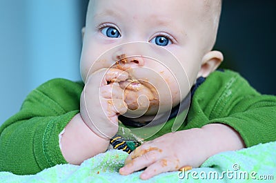 Baby eating Stock Photo