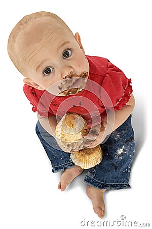 Baby Eating Muffins Stock Photo