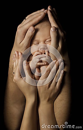 Baby in Family Hands Hold New Born Kid, Sleep Newborn Stock Photo