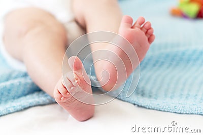 Baby feet on white background Stock Photo