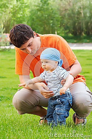 Baby first steps Stock Photo