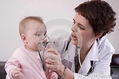Baby getting nebulizer treatment Stock Photo