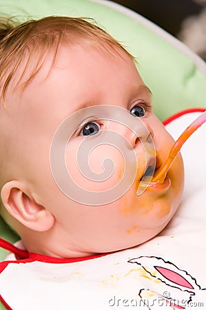 Baby girl appetite Stock Photo