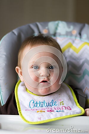 Baby girl being fed Stock Photo