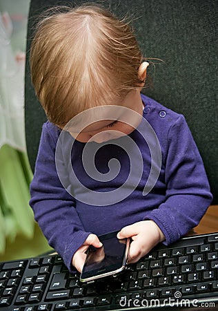 Baby girl call center Stock Photo