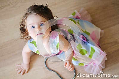 Baby-girl with chaplet Stock Photo