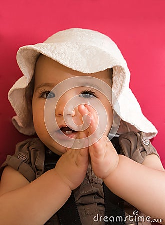 Baby girl claping Stock Photo