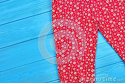 Baby girl colored patterned trousers. Stock Photo