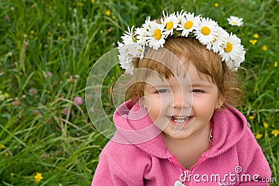 Baby girl with daisy wreath Stock Photo