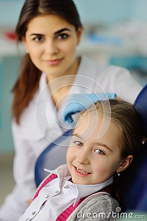 Baby girl at the dentist Stock Photo