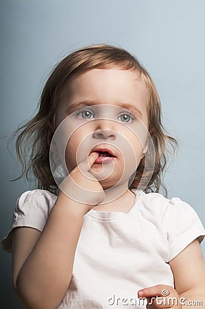 Baby girl dreamer Stock Photo