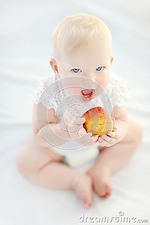 Baby girl eating healthy food Stock Photo