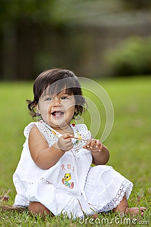 Baby Girl in grass Stock Photo