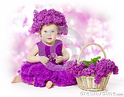 Baby Girl Lilac Flowers, Little Kid in Flower, Child Bouquet Stock Photo