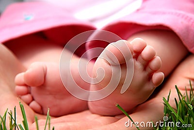 Baby Girl little toes in mothe Stock Photo