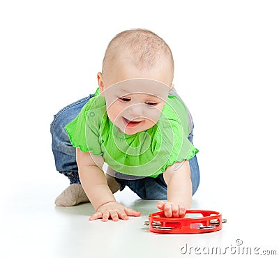 Baby girl playing with musical toy Stock Photo