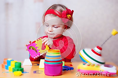 Baby girl playing sorter Stock Photo