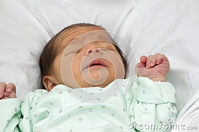 Baby girl ready to sneeze Stock Photo