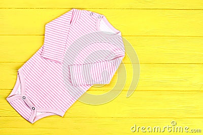 Baby-girl striped cotton romper. Stock Photo