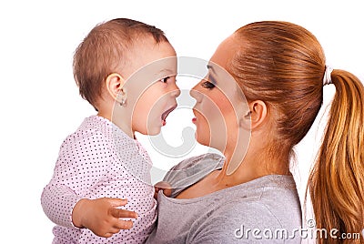 Baby girl talking with mom Stock Photo