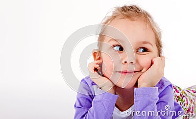 Baby girl thoughtfully hand on face Stock Photo