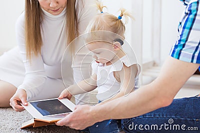 Baby girl wearing a hearing aid. Disabled child, disability and deafness concept. Stock Photo