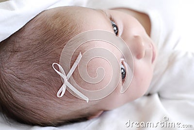 Baby Girl on White Blanket Stock Photo