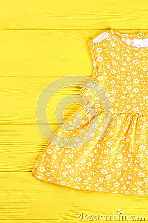 Baby-girl yellow printed top. Stock Photo