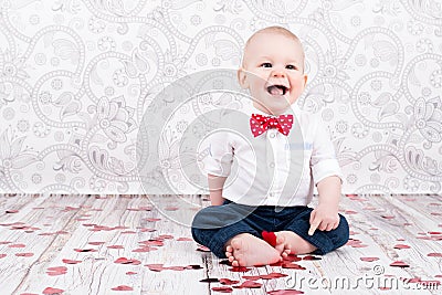 Baby with glittering hearts Stock Photo