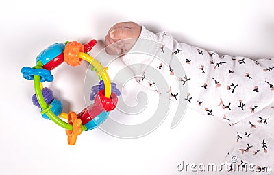 Baby hand female reaching for a toy, isolated on white Stock Photo