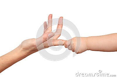 Baby hand grabbing a woman finger Stock Photo
